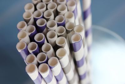 Close-up of drinking straws on table