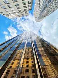 Low angle view of modern buildings against sky