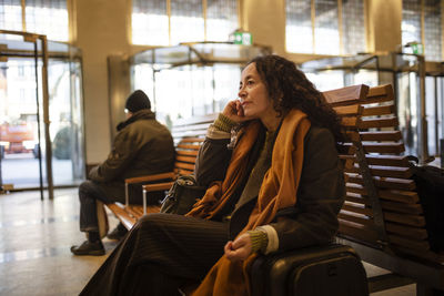 Woman waiting on train station