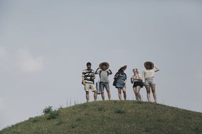 Low angle view of two people in row