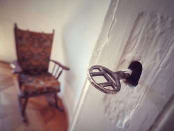 Close-up of door knocker on wall