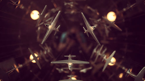 Close-up of lit lamp at night