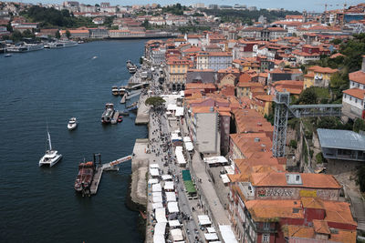 High angle view of townscape by sea