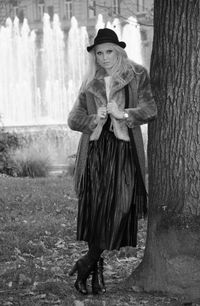 Portrait of man standing in park