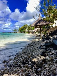 Scenic view of beach against sky