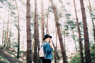 Man standing in forest