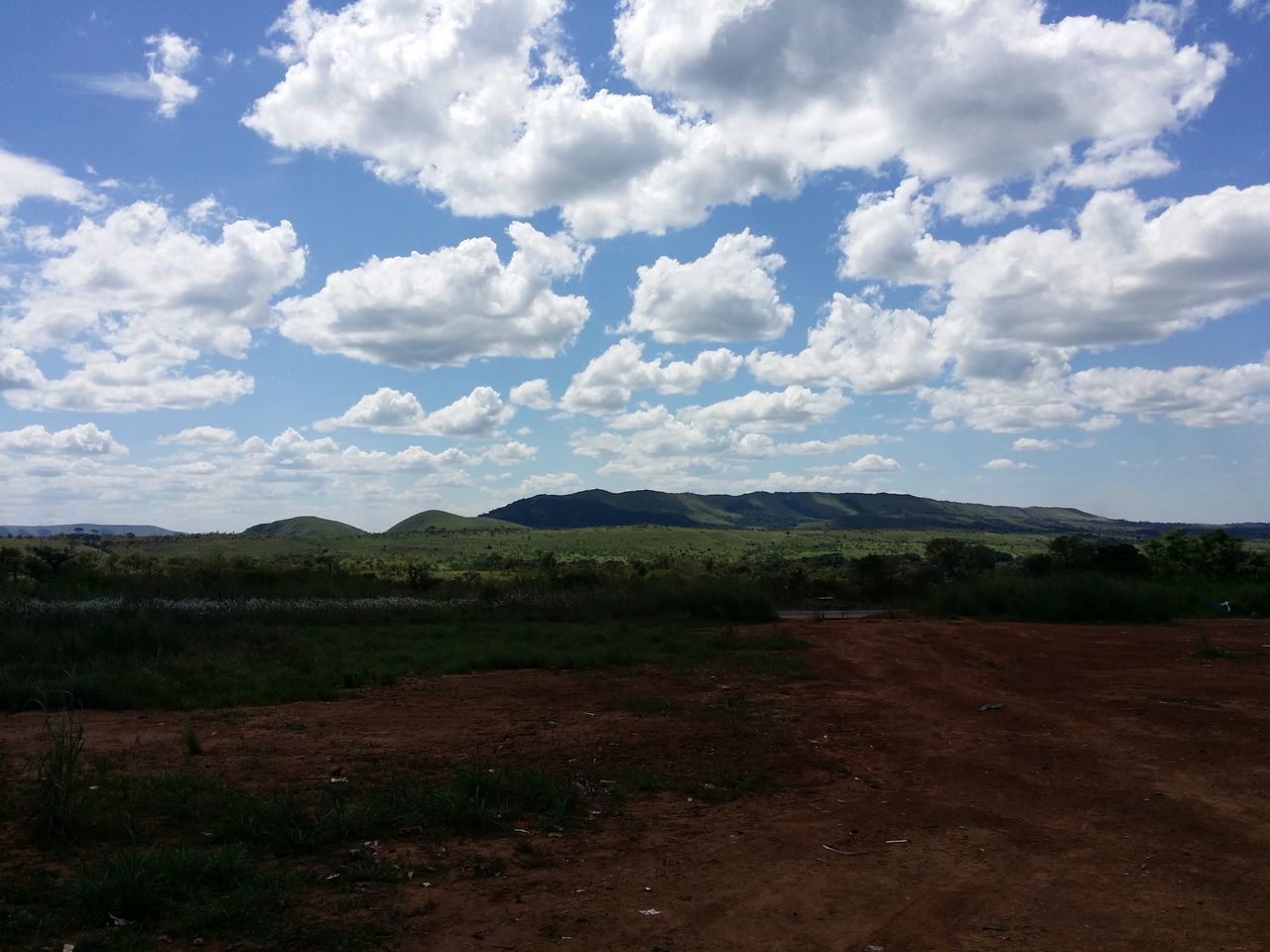 cloud - sky, landscape, sky, field, nature, scenics, tranquility, tranquil scene, beauty in nature, day, no people, outdoors, agriculture, mountain, tree, grass