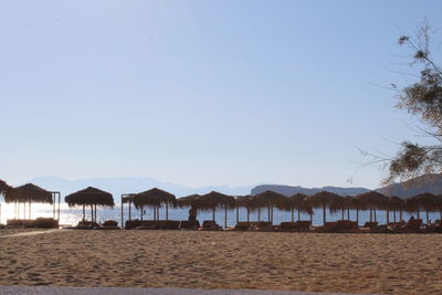 Scenic view of beach against clear sky