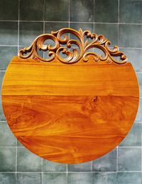 Close-up of bicycle on floor against wall