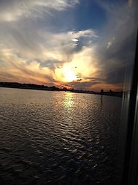 Scenic view of sea at sunset