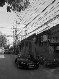 Cars on road against sky