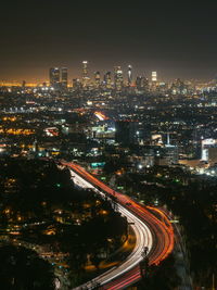 High angle view of illuminated cityscape