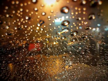 Close-up of water drops on glass