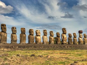 Statues against sky