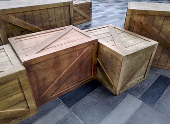 High angle view of group of wooden boxes