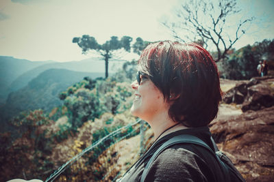 Portrait of young woman looking away