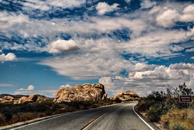 Surface level of empty road along landscape