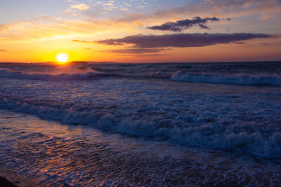 Scenic view of sea against sky during sunset