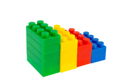 Close-up of multi colored toy over white background