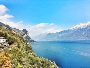 Scenic view of mountains against cloudy sky
