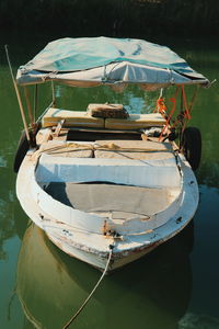 High angle view of fishing boats moored on shore