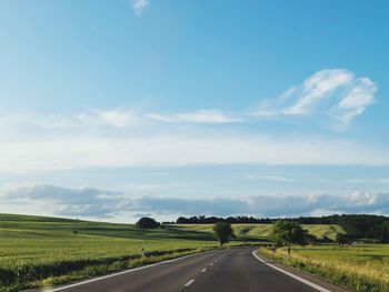 Empty road against sky