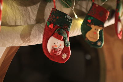 Close-up of christmas decoration hanging at home