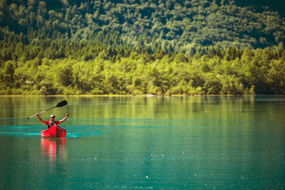 Man swimming in lake