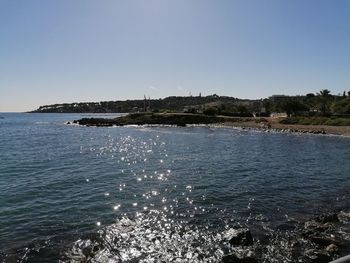 Scenic view of sea against clear sky