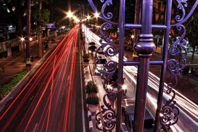 High angle view of light trails on street at night