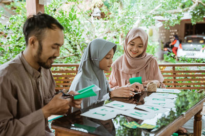 Young woman using digital tablet