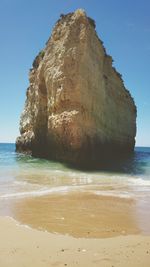 Scenic view of sea against blue sky