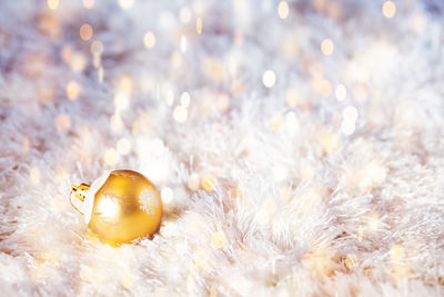 Close-up of bauble on fake fur