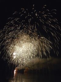 Firework display at night