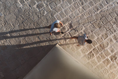 High angle view of man surfing on floor