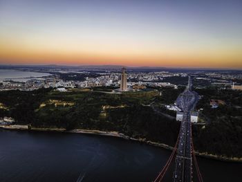 High angle view of bridge over river against buildings