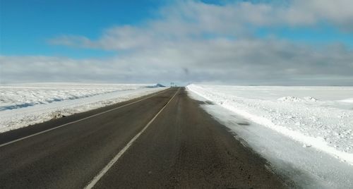 Road against sky during winter