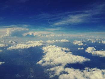 Aerial view of clouds over blue sky