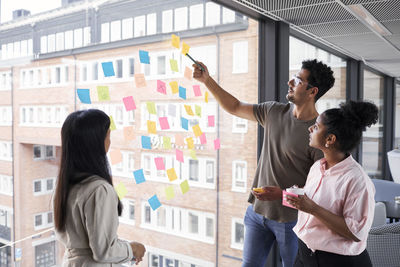 Coworkers having meeting in office