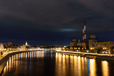 Reflection colorful illuminated lights on moskva river at night