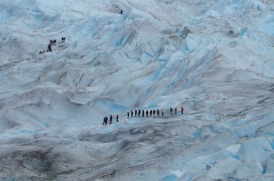 High angle view of people on snow