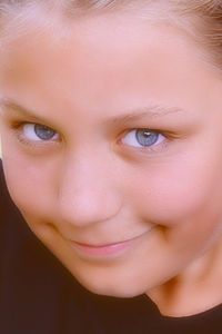 Close-up portrait of smiling woman