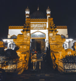 Illuminated building at night