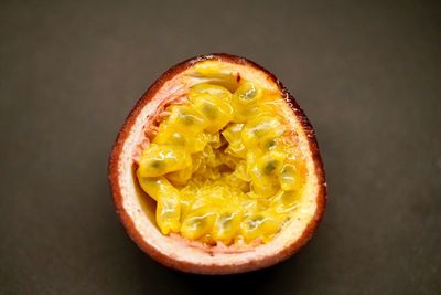 Close-up of lemon slice against black background