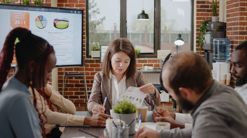 Business colleagues brainstorming in office