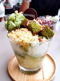 Close-up of ice cream in glass on table