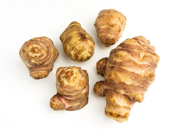 High angle view of cupcakes against white background