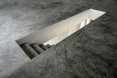 High angle view of staircase punching through the building floor