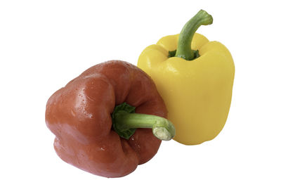 Close-up of bell peppers against white background