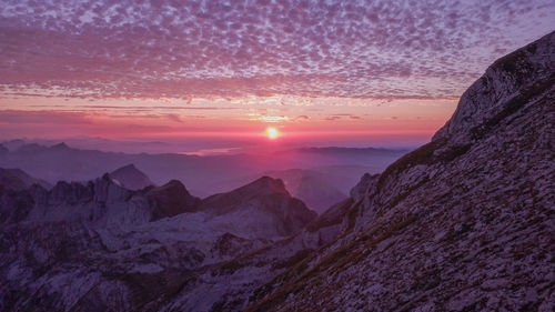 Scenic view of mountains against sky during sunset